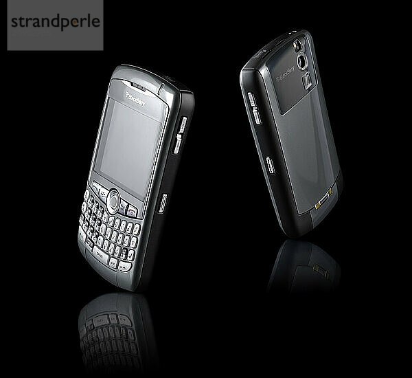 BlackBerry 8310 Curve stylish smartphone Isolated silhouette on black background