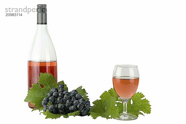 Rose wine with red Dornfelder grapes and vine leaves on white