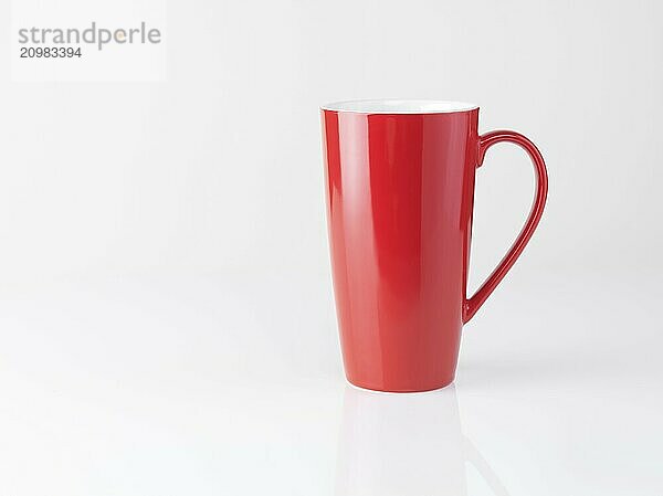 Red tall tea mug isolated on white background