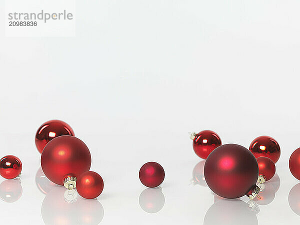 Christmas decoration ornament. Red glass baubles isolated on white background with copy space