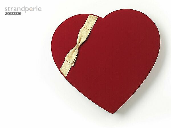 Red heart-shaped gift box isolated on white background