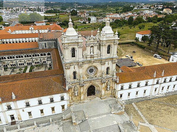 The picture shows a historic monastery with baroque architecture in an urban landscape  aerial view  Mosteiro de Alcobaça Monastery  Alcobaca  Oeste  Centro  Portugal  Europe