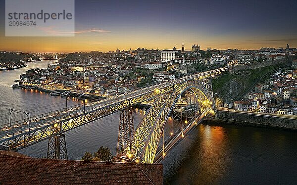 Porto City View ad dawn with Douro river and D. Luis Bridge  in Portugal