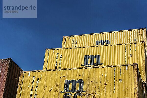 Gothenburg  Sweden  April 03 2022: Yellow MSC shipping containers stacked high  Europe