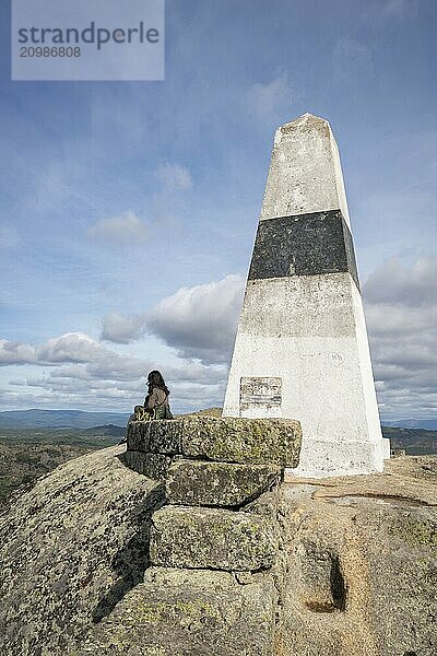 Caucasian woman on Picoto highest point of Monsanto castle with landscape view  in Portugal