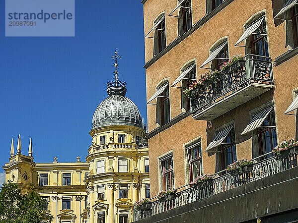 A yellow building with a striking dome and several balconies on the façade  stockholm  baltic sea  sweden  scandinavia