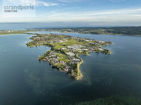 Aerial view  of the north-western tip of the island of Reichenau in Lake Constance  with the district of Niederzell and the columned basilica of St Peter and Paul  with Windegg Castle on the shore  district of Constance  Baden-Württemberg  Germany  Europe