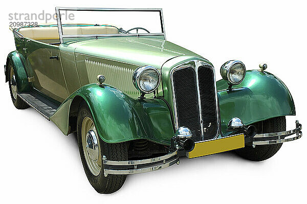 Classic green convertible Audi vintage car at auto show isolated silhouette on white background with clipping path. Emblems and trademarks were removed on this image