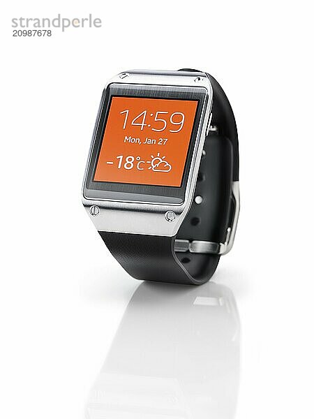 Samsung Galaxy Gear smartwatch with orange display closeup. Isolated watch on white background with clipping path