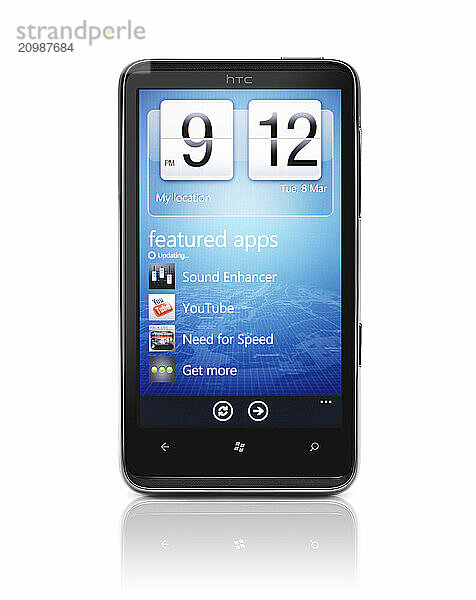 Windows 7 phone. HTC HD7 smartphone with app store on its display isolated with clipping path on white background. High quality photo