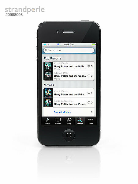 Harry Potter search results at iTunes store on display of Apple iPhone 4 smartphone isolated with clipping path on white background