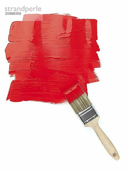 Red paint copyspace and a paintbrush on white background