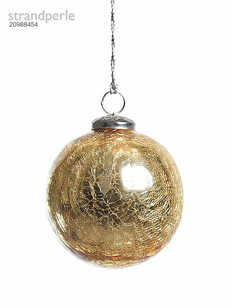 Christmas decoration golden glass ball isolated on white background