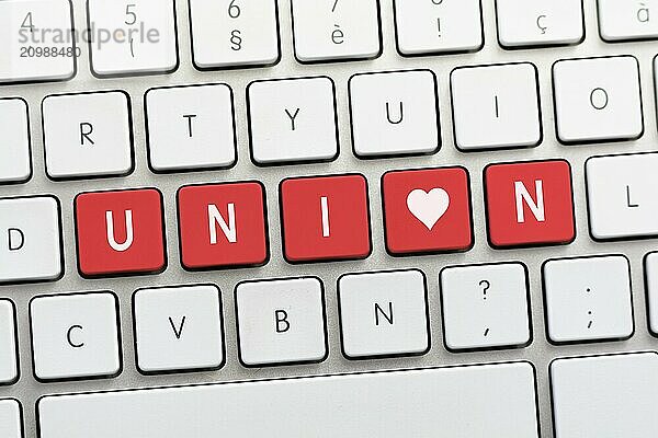 UNION writing on white keyboard with a heart sketch