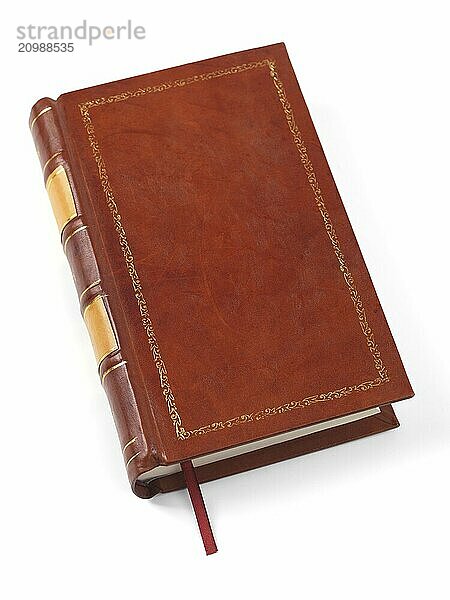 Hardcover brown leather bound book isolated on white background