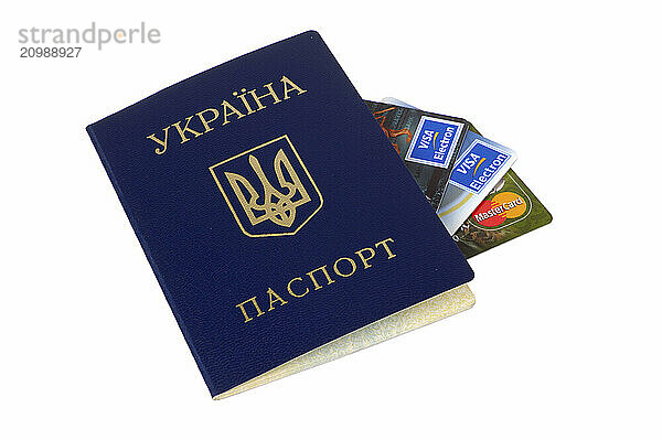 Ukrainian passport with creditcards isolated on white