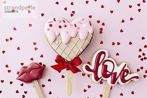 Gingerbread cookies love  lips  heart ice cream. Valentine card. Pink background.