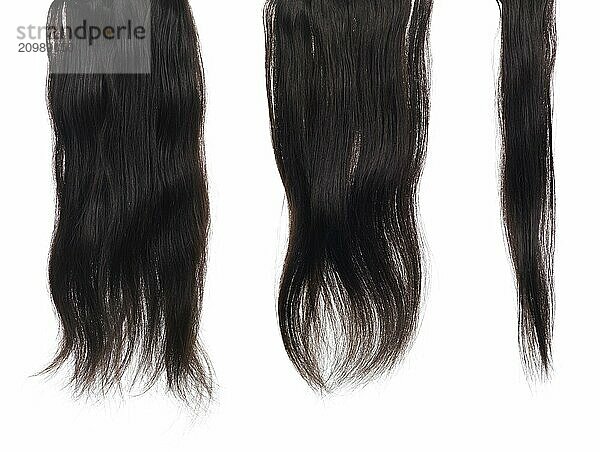 Strands  locks of dark brown hair extensions with real hair isolated texture on white background