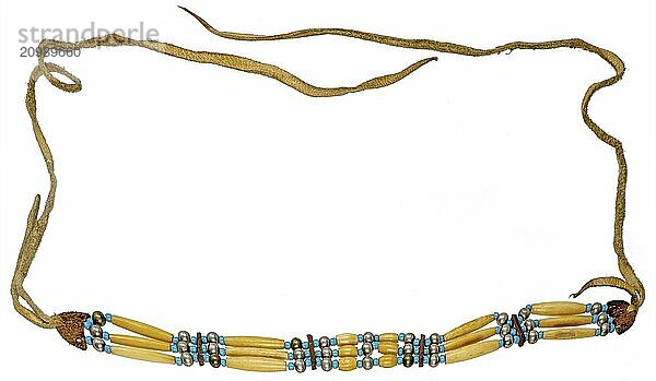 Native American necklace made of bone  glass beads and leather strips cut out on white