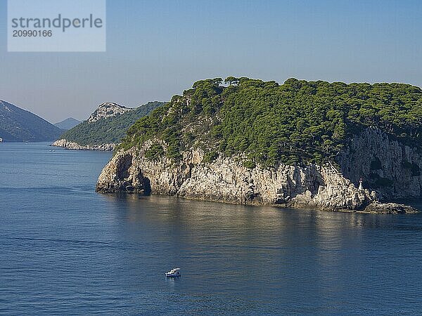 View of a wooded island on a calm blue sea  dubrovnik  Mediterranean Sea  Croatia  Europe