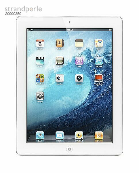 White Apple iPad 2 tablet computer with blue ocean desktop theme on its display. Isolated with clipping path on white background