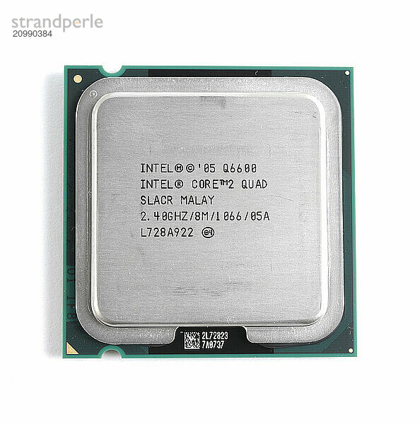 Intel Core 2 Quad Q6600 CPU Quad core computer processor closeup isolated on white