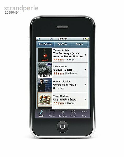 Apple iPhone 3Gs 3G smartphone with iTunes store listings on the screen isolated with clipping path on white background. High quality photo