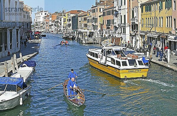 Two brave souls on the Canal Canareggio