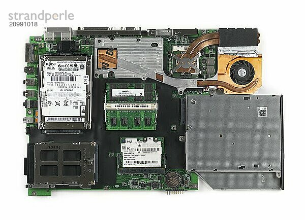 Laptop computer motherboard with all harware installed isolated on white background