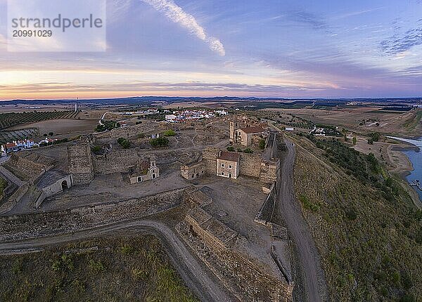 Juromenha castle  village and Guadiana river drone aerial view at sunset in Alentejo  Portugal  Europe