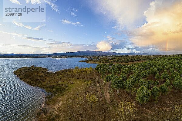 Lake drone aerial view of mountain panorama landscape at sunset in Marateca Dam in Castelo Branco  Portugal  Europe