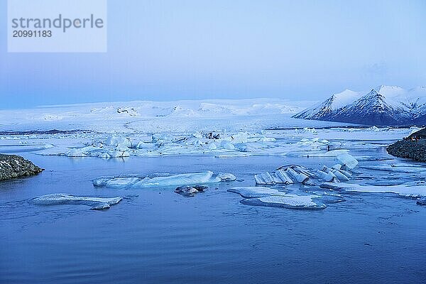 Beautiful sunrise view of Jokulsarlon ice lake at night in winter. Iceland