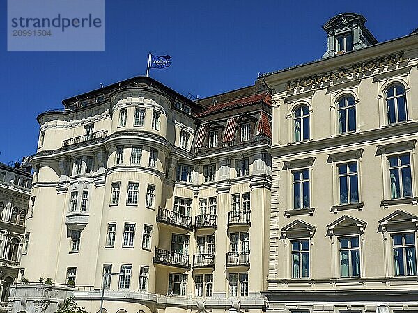 Elegant building with balconies and white façade in the sunshine  stockholm  baltic sea  sweden  scandinavia