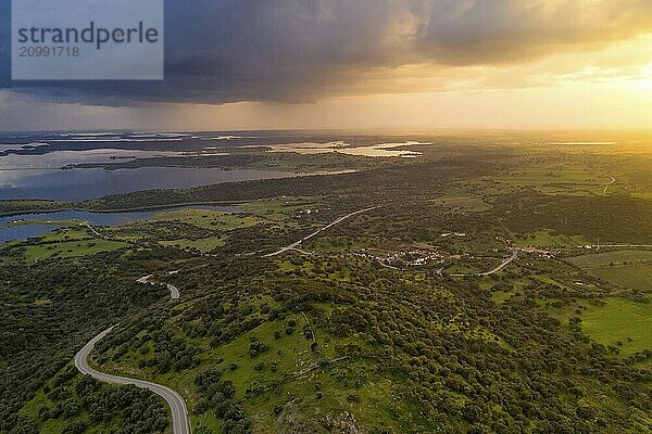 Alentejo drone aerial view of the landscape at sunset with alqueva dam reservoir  in Portugal