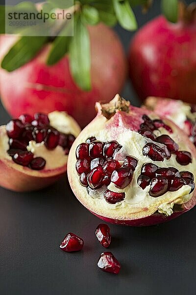 Closeup of pomegranate fruit on a black background