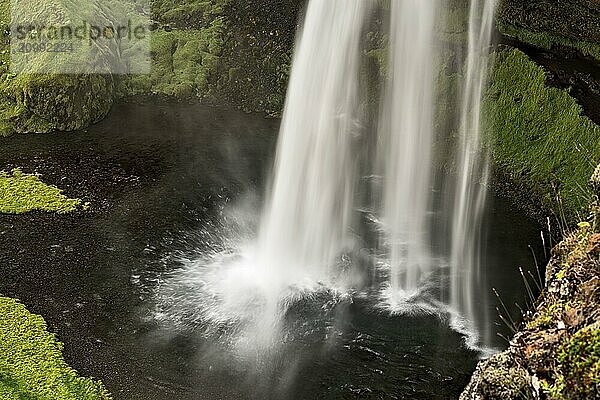 Closeup of Seljalandsfoss waterfall seen from above  Iceland  Europe