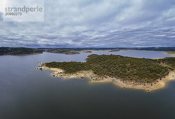 Drone aerial view of Idanha Dam Marechal Carmona landscape with beautiful blue lake water  in Portugal