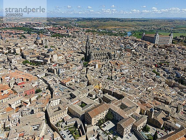 Close-up of the city centre with historic architecture and sweeping views under a cloudy sky  aerial view  Cathedral and Alcázar  Alcazar  Toledo  River Tagus  Castilla-La Mancha  Spain  Europe