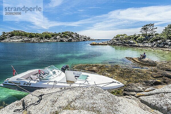 Lindesnes  Norway  June 21 2017: power boat at a beautiful bay one fantastic summer day in southern Norway  Europe