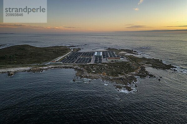 Amazing drone aerial landscape view of a Sea fishing farm on land at sunset in Galiza  Spain  Europe