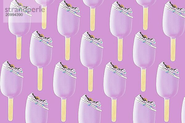 Isolated bitten pink cookie ice creams on a stick on pink background. Flat lay with icecream pattern