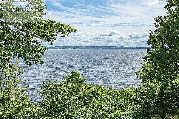 Nice view over a lake. Trees in the foreground