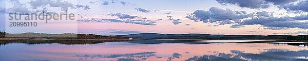 Panorama of a lake reservoir dam landscape view at sunset during autumn fall in Sabugal Dam  Portugal  Europe