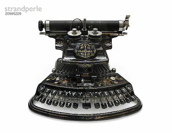 The Crandall New Model antique typewriter invented by Lucien Crandall in 1875 Isolated with clipping path on white background