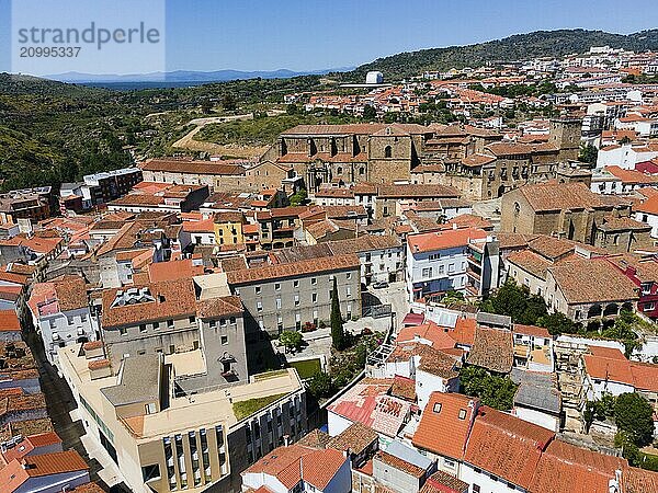 Overview of a town with red roofs and historic buildings  embedded in a hilly landscape  aerial view  Plasencia  Cáceres  Caceres  Extremadura  Spain  Europe