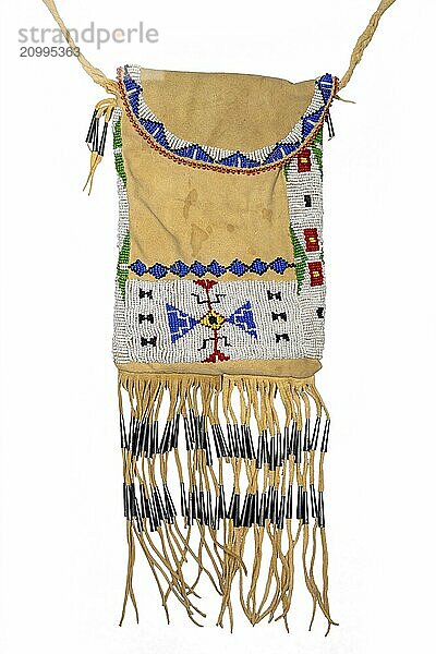 Bag of the North American Indians. Made from deerskin embroidered with colourful glass beads and leather cords on a white background