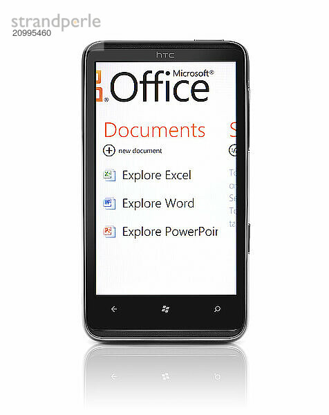 Windows 7 phone. HTC HD7 smartphone with Microsoft Office Mobile on its display isolated with clipping path on white background. High quality photo
