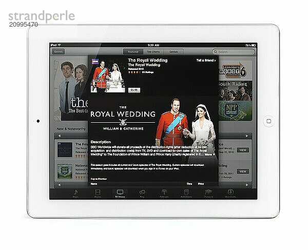 Apple iPad 2 tablet computer with iTunes TV shows featuring the royal wedding on its display. Isolated with clipping path on white background