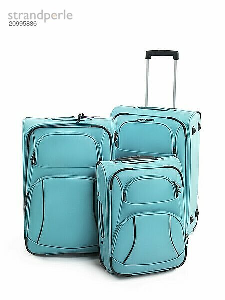 Three blue suitcases isolated on white background