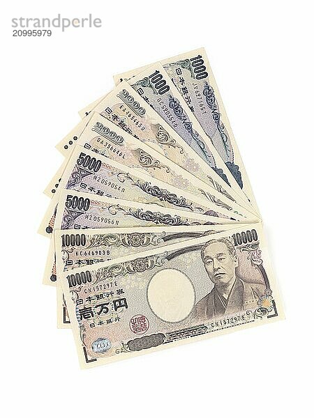 Japanese Yen money bills  closeup of currency isolated on white background